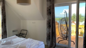 Bedroom 2 with view on Lipno Lake